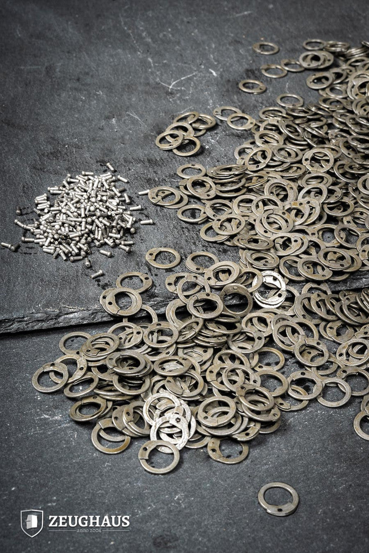 Anillas planas cota de malla con remaches acero engrasado (9 mm.)