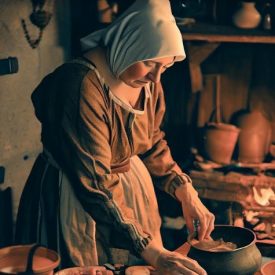 Campesina medieval en su cocina medieval